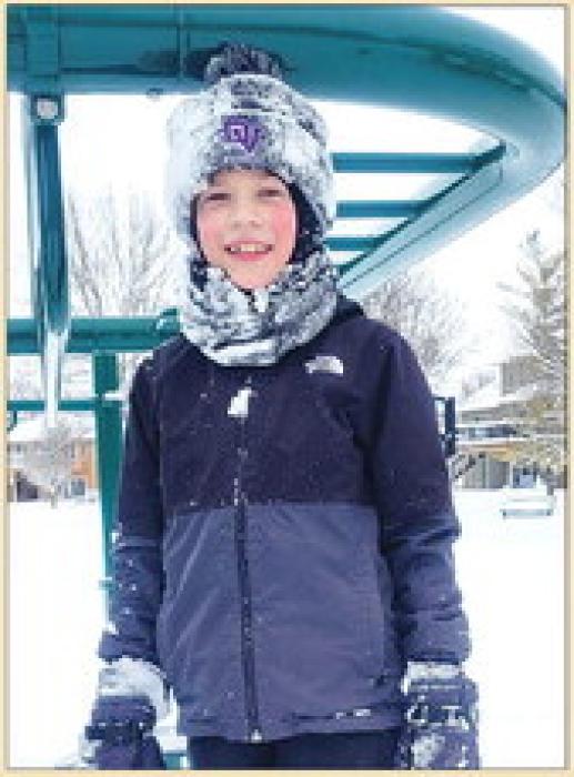 Jack Galles, of Dakota Dunes, had fun playing with friends on the Jan. 19 snow day