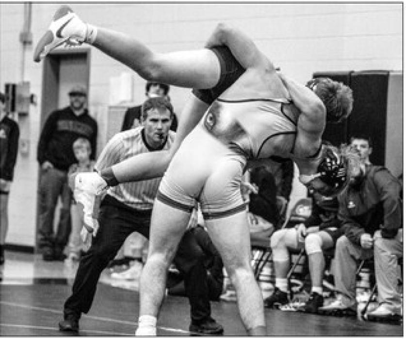 Ben Swatek (182) flips his McCook Central/Montrose opponent and wins by a 7-4 decision. Photo by Peterman Sports Photography stevepeterman5@gmail.com