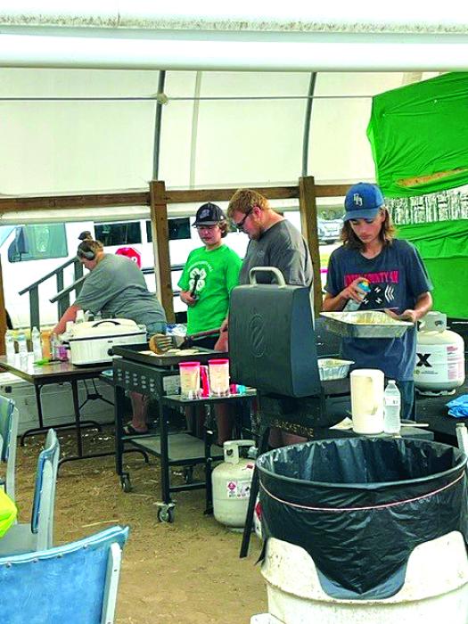 Union County 4-H Teen Leaders prepare breakfast foods for the public. Submitted photo