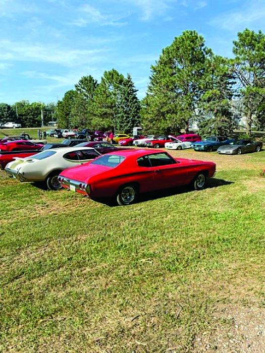 Cars lined the way during the annual Tractor &amp; Car ‘Show and Shine’. Submitted photo