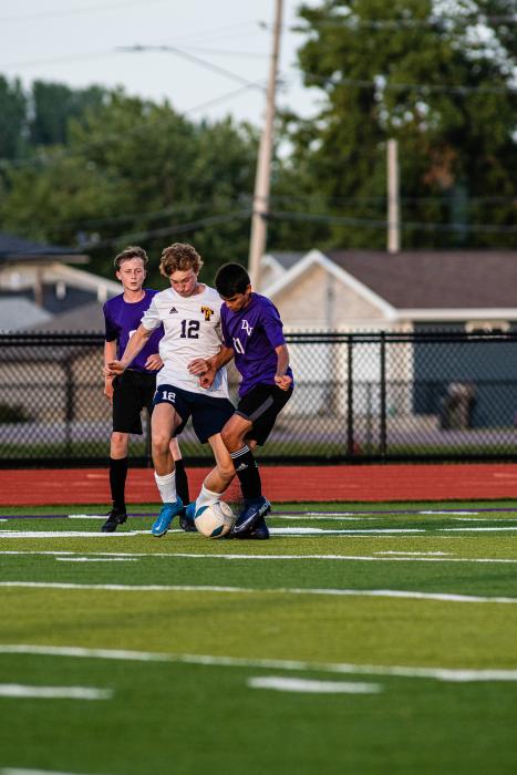 Bryan Cardona makes a move against a Tea Area player during their game Aug. 18. He played a solid offensive game against Freeman Academy Aug. 27.  Photo by Peterman Sports Photography • photoman@iw.net