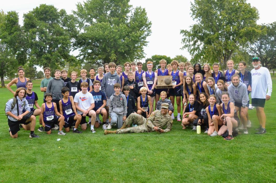 The Dakota Valley Cross Country team poses with the Old Canteen that they won at the Union County Quad in Elk Point Sept. 22. The last time the Panthers won the Old Canteen was in 2012. Photo by Kelly Riibe • times2reporter@gmail.com