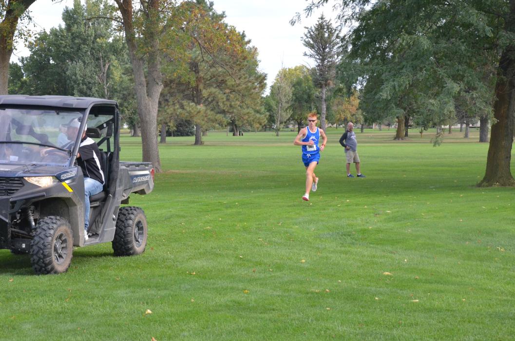 Joe Cross followed the pace car all the way to the finish line at the Union County Quad in Elk Point Sept. 22. Cross set a new meet record with a time of 15:47. Photo by Kelly Riibe • times2reporter@gmail.com