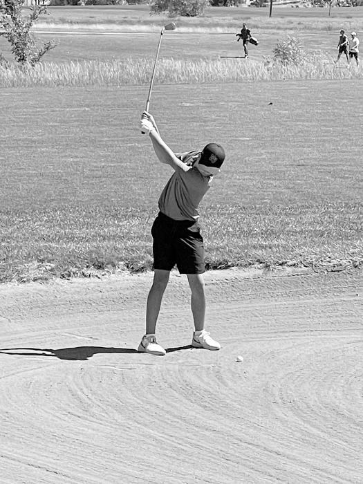 Tate Cornelsen swings out of the bunker and takes 1st place in the Junior Varsity contest at Beresford.  Submitted photo