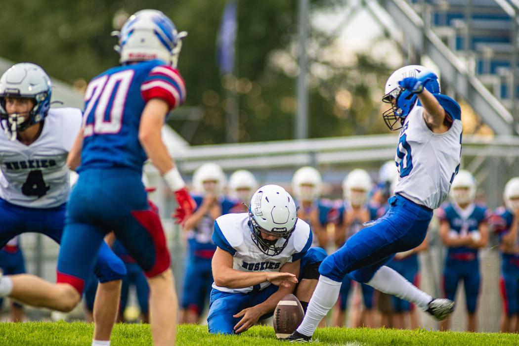 Carson Timmins made 6 extra points in a row against Parker. During the Baltic game Aug. 26 he made 7/8 PATs. Photo by Peterman Sports Photography • photoman@iw.net