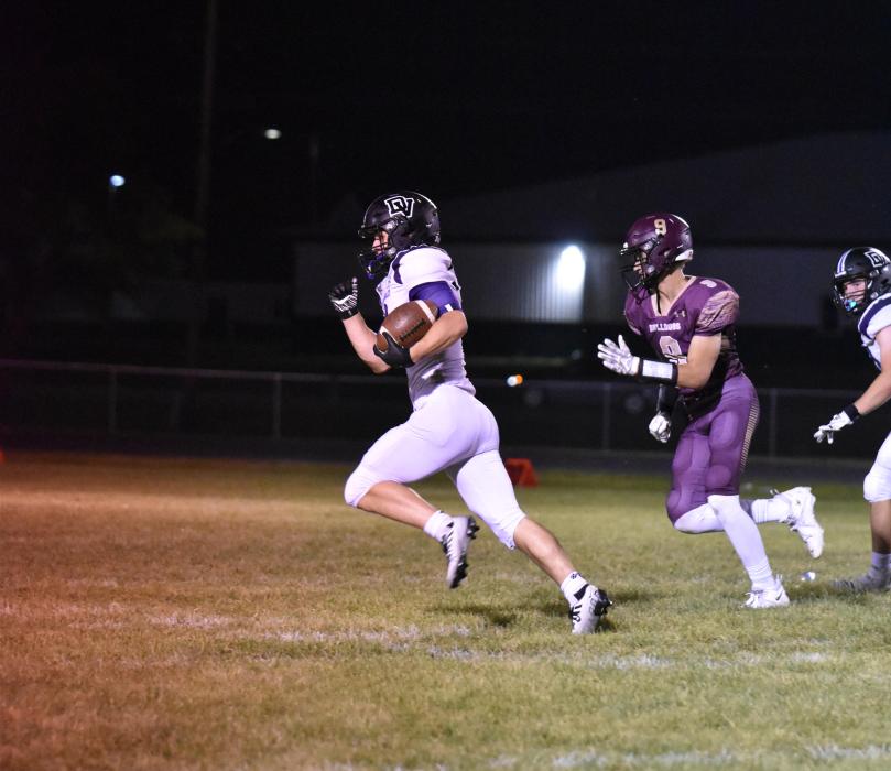 Ethan Anema, in a quarterback sneak, kept the ball to run it in for the first TD of the game. Photo courtesy of Grant County Review