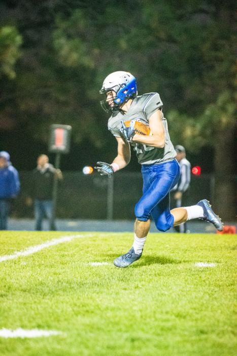  Garrett Merkley returned the opening kick off Oct. 7 against Tri-Valley. Photo by Peterman Sports Photography stevepeterman5@gmail.com