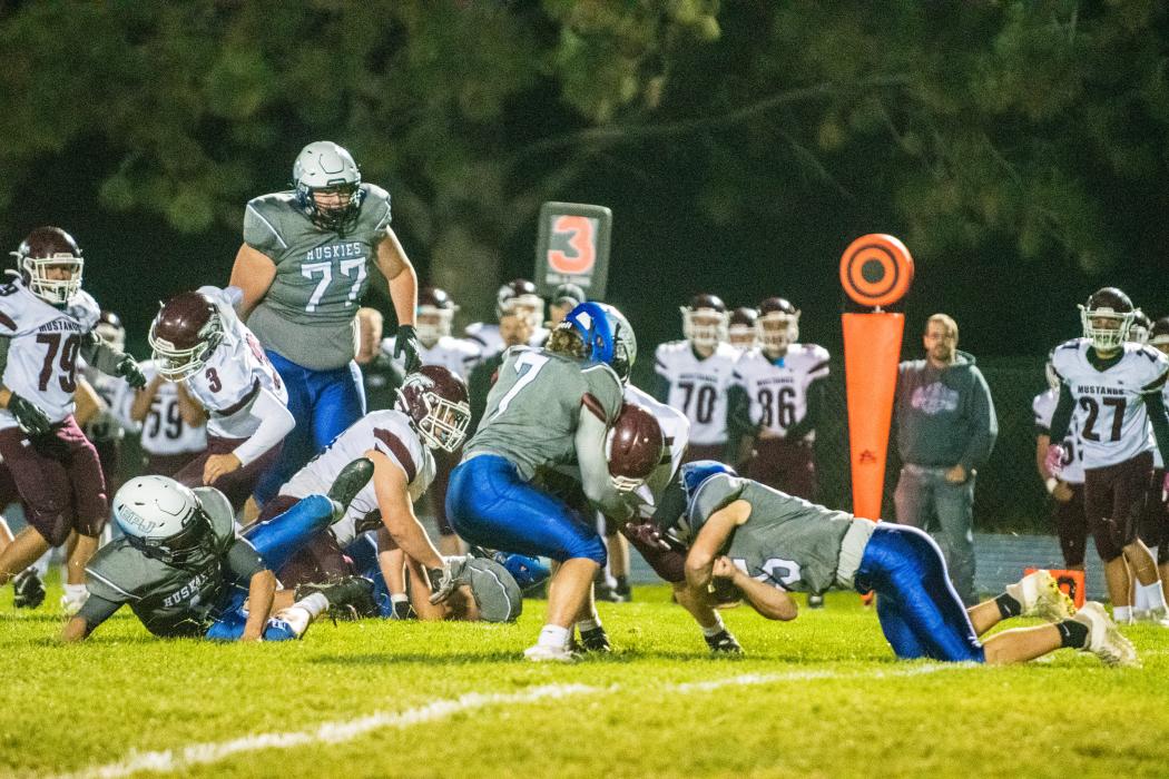 Hunter Geary and Hunter Sharkey hunt down the Tri-Valley quarterback. Photo by Peterman Sports Photography • stevepeterman5@gmail.com