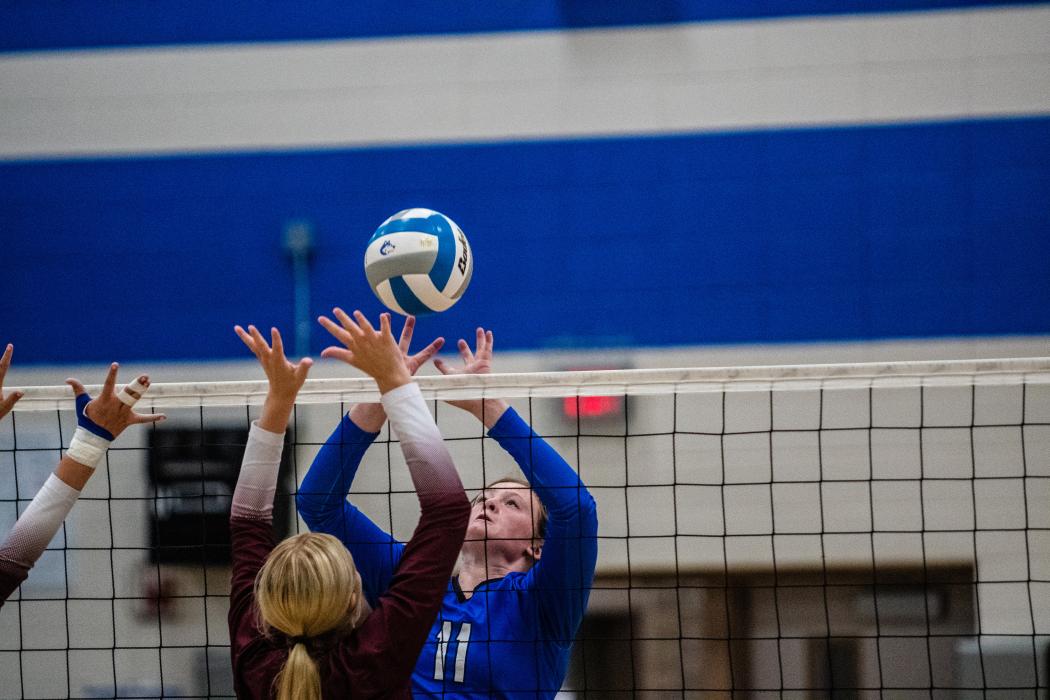 Josie Curry tips the ball over the Tri-Valley blocker to record one of her 2 kills on the night. Photo by Peterman Sports Photography stevepeterman5@gmail.com