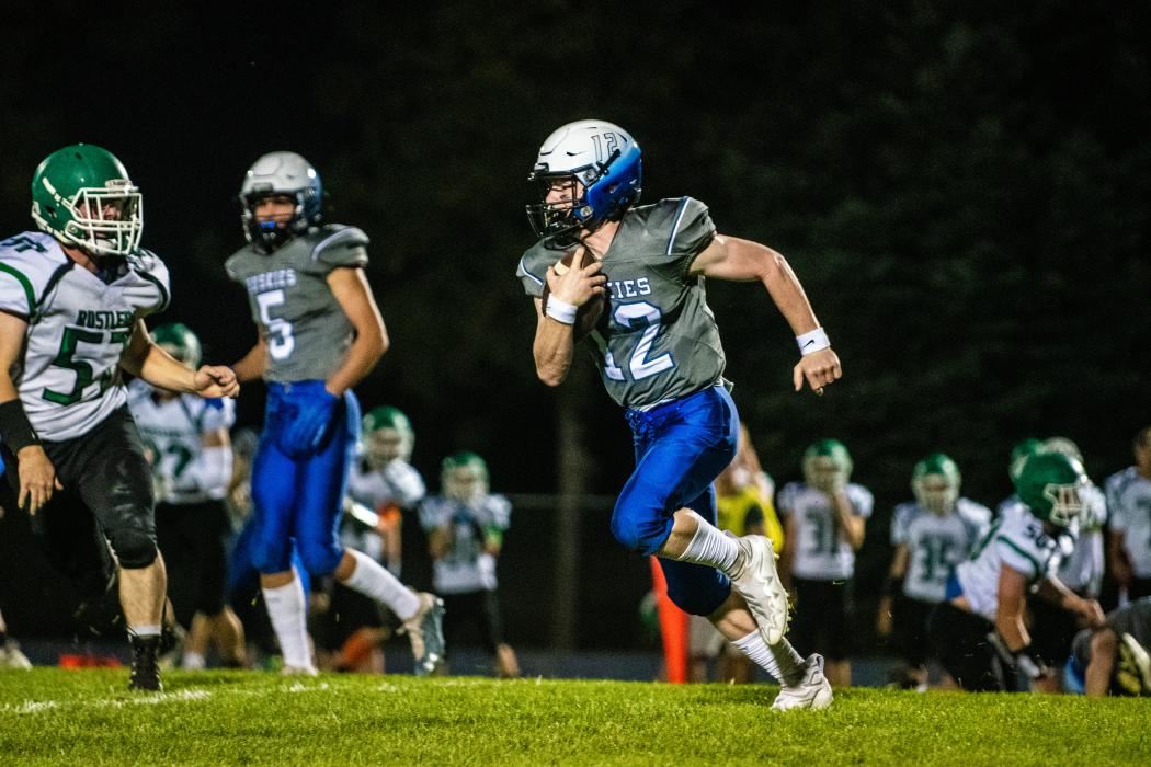 Noah McDermott runs the ball in for a touchdown. He also threw two touchdown passes Sept. 30. Photo by Peterman Sports Photography stevepeterman5@gmail.com