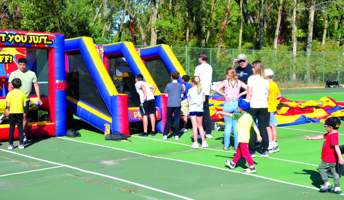 Dakota Dunes Fall Festival, Oct. 2. Other events were available for community members to play, such as an inflatable basketball hoop and various carnival games.  Photos by Kelly Riibe • times2reporter@gmail.com