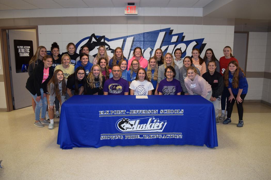 Sophia Giorgio was surrounded by her family, friends and teammates as she signed her letter of intent to play volleyball. Giorgio, a senior volleyball player at Elk Point-Jefferson signed her letter of intent with Avila College in Kansas City, MO to play volleyball Nov. 2. Submitted photo