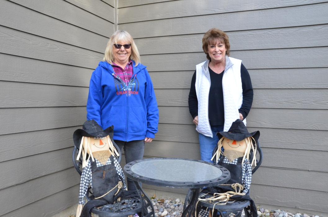 Kathy Wrage and Valerie Danielson decorate their cul-de-sac on Prairie Bend every year for Halloween. Photo by Kelly Riibe • times2reporter@gmail.com