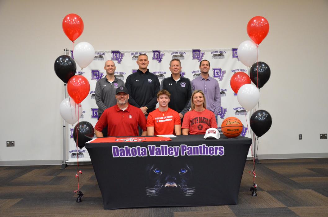 Issac Bruns signed his letter of intent to play basketball at USD. Pictured are, front from left, Paul Bruns (dad), Isaac Bruns and Jamie Bruns (mom); and back, Trae Bergh, DV Head Bball Coach Jason Kleis, Brian Uhl, Nathan Connelly. Photo by Kelly Riibe • times2reporter@gmail.com