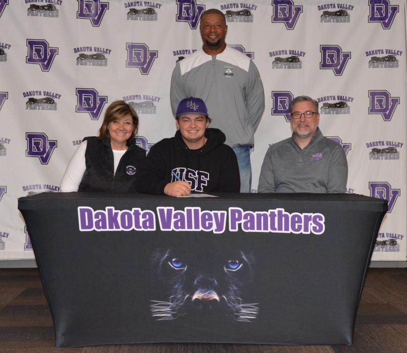Pictured from front left, are Beth Pruchniak, Jake Pruchniak and Wayne Pruchniak; and back, DV Baseball Coach Rob Augustine. Photo by Kelly Riibe • times2reporter@gmail.com