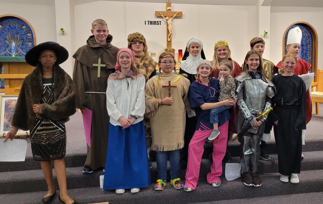 A program titled “For All of the Saints!” was held at St. Teresa of Calcutta’s, in Dakota Dunes, on the evening of Wednesday, Oct. 26. Sixth graders in the religious education class, taught by Phil Kratz, dressed as saints and gave a short speech. Each student was able to choose their own saint to research and speak about him or her in front of the crowd at the church. Joan of Arc and St. John the Baptist were just a few of the highlighted saints. Parents, parishioners and K-5th graders were in attendance t
