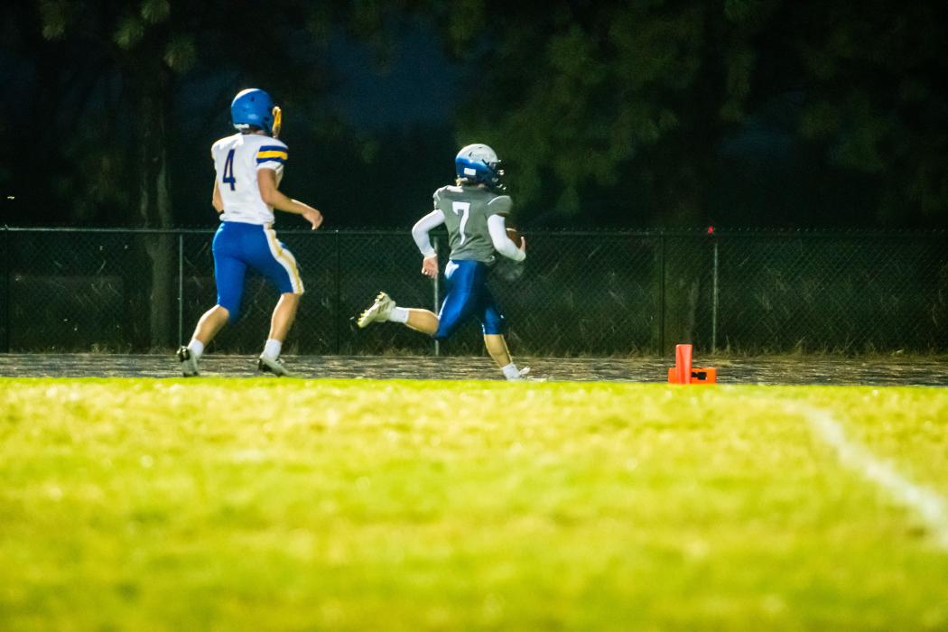 Hunter Geary runs it in 25 yards for a pick six. Photo by Peterman Sports Photography stevepeterman5@gmail.com