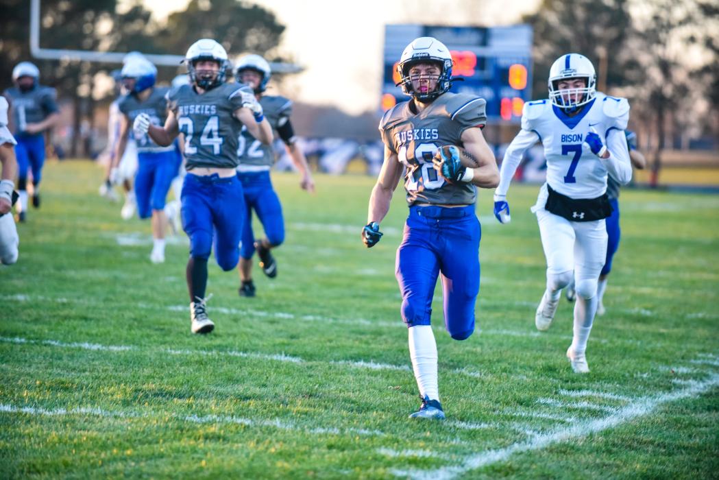 Garrett Merkley wasted no time in scoring points for Elk Point-Jefferson Nov. 4. He scored a touchdown on the opening kickoff to the game. Photo by Peterman Sports Photography stevepeterman5@gmail.com