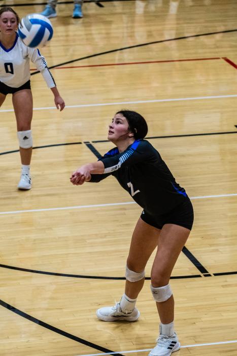 Danica Torrez passes the ball up to the front row. Photo by Peterman Sports Photography stevepeterman5@gmail.com