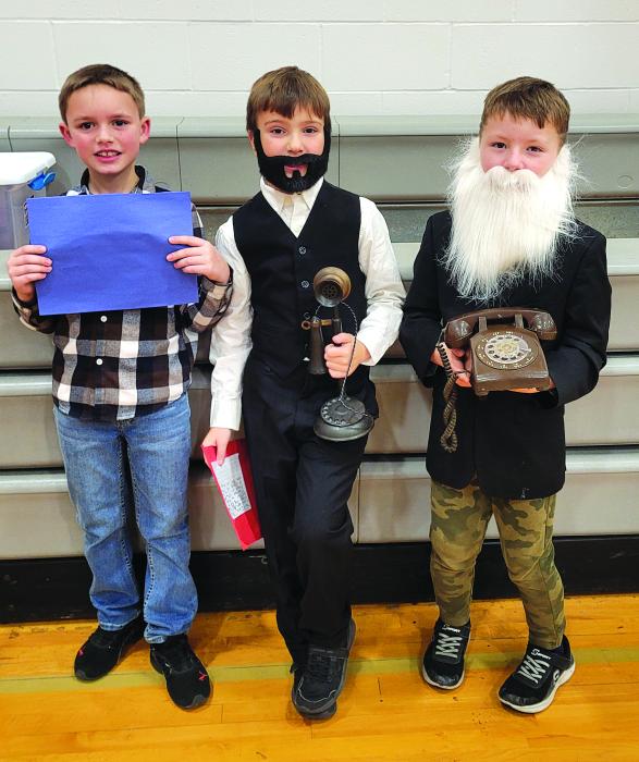 Greyson Sprock, Alex Redler and Graham Riibe were all Alexander Graham Bell for the DVES’s Living Timeline Nov. 22.  Photo by Kelly Riibe • times2reporter@gmail.com