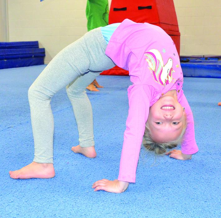 Dakota Pearman, of North Sioux City, showed off her flexibility at the “Winter Break Camp” hosted by V.I.P Gymnastics, Ninja, and Cheer. Photo by Kelly Riibe • times2reporter@gmail.com