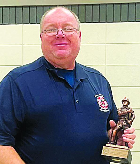 (Left) North Sioux City Assistant Fire Chief Jim Christenson was awarded for his 35 years of dedication to the fire department. Submitted photos