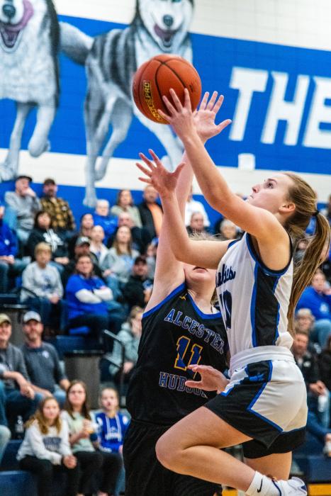 Hannah Nearman attacks the basket against Alcester-Hudson Jan. 6