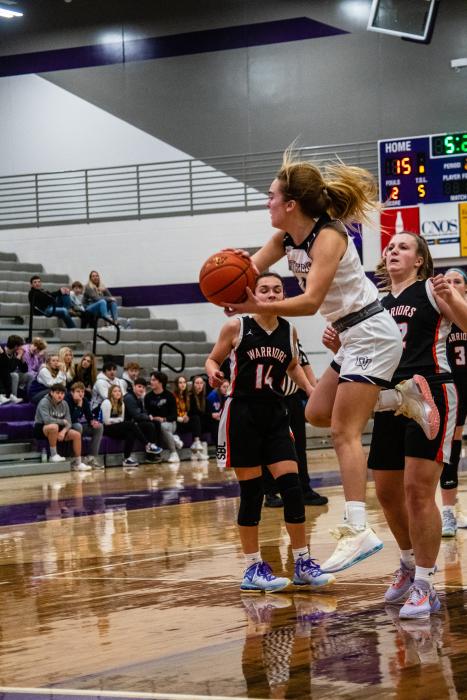 Sophie Tuttle saves the ball from going out of bounds during their game against Sergeant Bluff-Luton. Photo by Peterman Sports Photography stevepeterman5@gmail.com