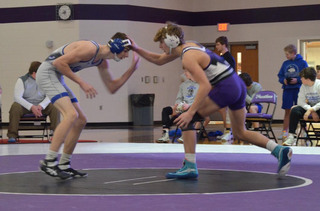 Bennett Lukken reaches out to make a move against Elk Point-Jefferson’s Hayes Johnson. Photo by Kelly Riibe • times2reporter@gmail.com