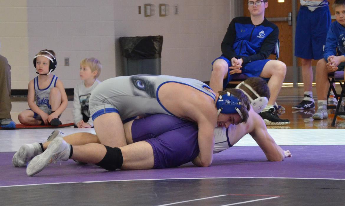 Ben Swatek works his DV opponent, Lake Kistner, to win the match with a pin in 1:57 Feb. 7. Photo by Kelly Riibe • times2reporter@gmail.com