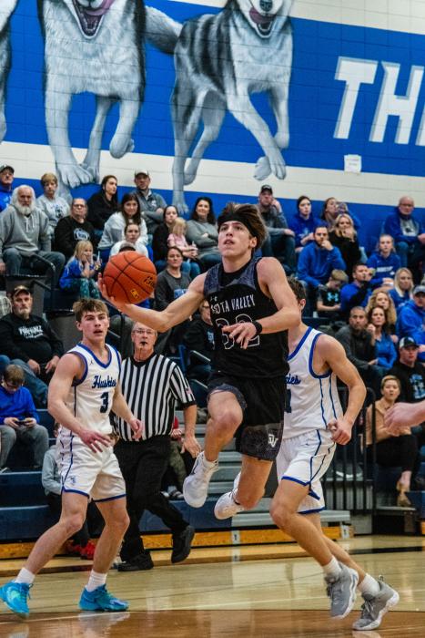 Randy Rosenquist, the assist king, almost had a triple-double against Elk Point-Jefferson Feb.2 with his 9 points,10 rebounds and 14 assists. Photo by Peterman Sports Photography stevepeterman5@gmail.com
