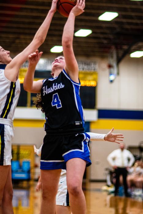 Ashley Brewer goes up for one of her 10 points against Tea Area Feb. 21. Photos by Peterman Sports Photography stevepeterman5@gmail.com