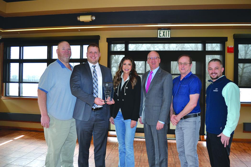 North Sioux City City Council President Dan Parks, North Sioux City Economic Development Corporation Executive Director Andrew Nilges, South Dakota Governor Kristi Noem, Managing Editor of Site Selection magazine Adam Bruns, North Sioux City City Administrator Eric Christensen and North Sioux City City Council Vice-President Kodi Benson stand for a picture while receiving an Economic Development award. Submitted photo