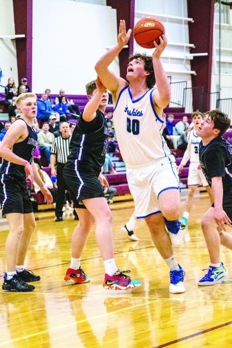 Chace Fornia powers his way to the basket. Photo by Peterman Sports Photography stevepeterman5@gmail.com