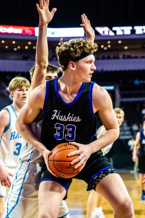 Evan Fornia looks for an open teammate against Hamlin at the Class A State Boys Basketball tournament in Sioux Falls.  Photo by Peterman Sports Photography  •stevepeterman5@gmail.com