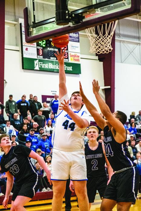 Easton Kempf goes up for the bunny. He had 7 points and 10 rebounds during the game. Photo by Peterman Sports Photography stevepeterman5@gmail.com