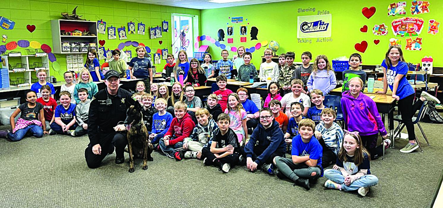 South Dakota Highway Patrol Trooper Trent Heuertz was invited to the Elk Point-Jefferson third grade class to speak about Nala, his K9. Every year, Trooper Heuertz speaks to third grade classes in conjunction with their reading unit that includes the book “Aero and Officer Mike.” It is a book about a police officer and his K9.  Trooper Heuertz talks to students about how the Highway Patrol uses its police service dogs, and how the Highway Patrol selects dogs, trains them and uses them. He uses Nala to demon