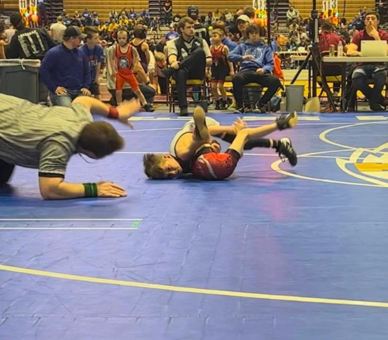 Reece Chicoine looking for a pin in quarter finals match. Submitted photo