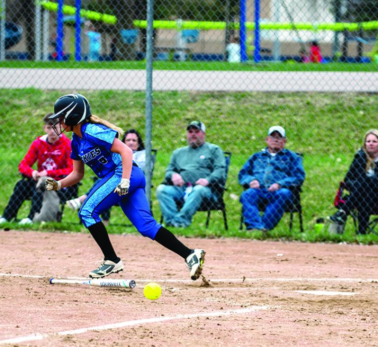 Alyssa Chytka puts down a perfect bunt. Photo by Peterman Sports Photography • stevepeterman5@gmail.com