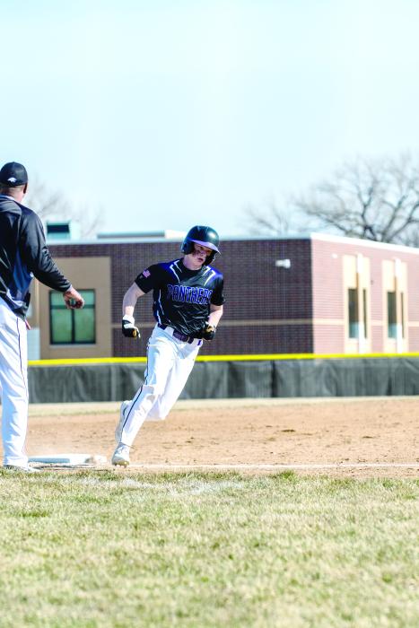 Kade Kessler rounds third base and heads for home plate. Photo by Peterman Sports Photography • stevepeterman5@gmail.com