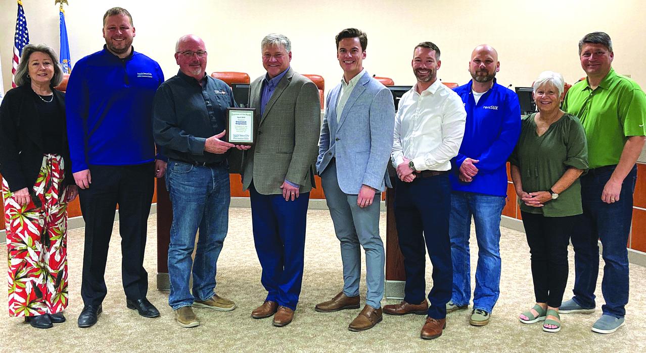 The North Sioux City Economic Development Corporation (NSCEDC) has named its April Business of the Month. The Business of the Month is Stockwell Engineers. Pictured are, from left, North Sioux City Mayor Patti Teel, NSCEDC Executive Director Andrew Nilges, NSCEDC Board President Mike Huber, Stockwell Engineers President Jon Brown, Stockwell Engineers Project Engineer Dane Ekdom and NSCEDC Directors Dustin Pratt, John Stevens, Kathy Gunderson and Kevin Heiss. Submitted photo