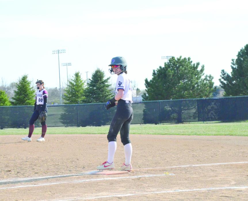 Mia Riibe smiles as her single hit led a teammate to score the first run of the game for the Panthers April 17 against Madison. Photo by Kelly Riibe • times2reporter@gmail.com