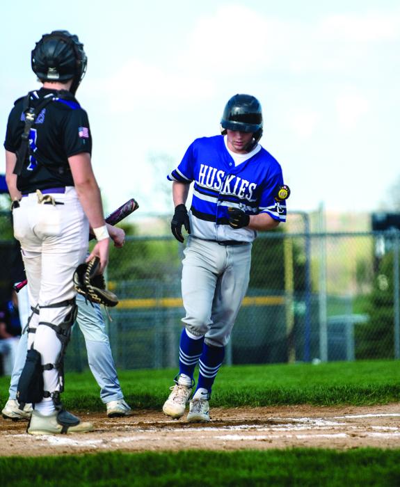 Jake Gale crosses home plate to score 1 of 4 of Elk Point-Jefferson’s runs against Dakota Valley May 9. Photo by Peterman Sports Photography stevepeterman5@gmail.com