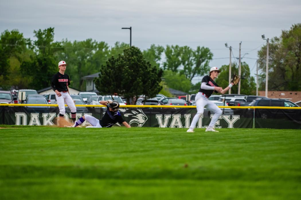 Senior Randy Rosenquist slides safely into second base. Photo by Peterman Sports Photography • stevepeterman5@gmail.com