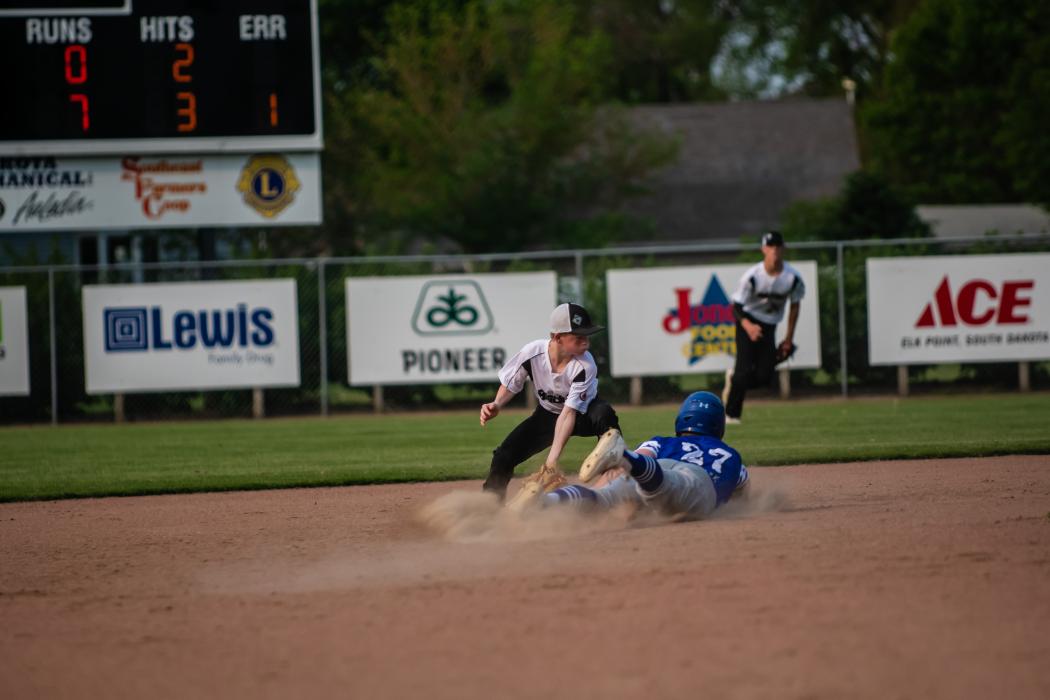 Ben Swatek makes it safely to second base after the ball went past the second baseman against Beresford/Alcester-Hudson May 17. Photo by Peterman Sports Photography • stevepeterman5@gmail.com