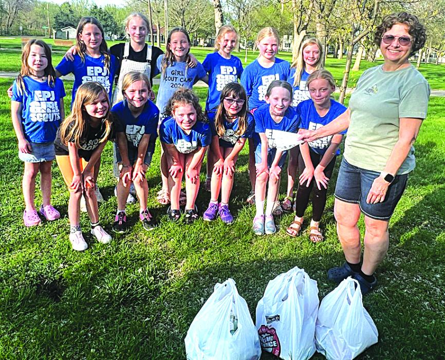 The Elk Point-Jefferson Girl Scouts donated food and money to the Elk Point Food Pantry May 9.