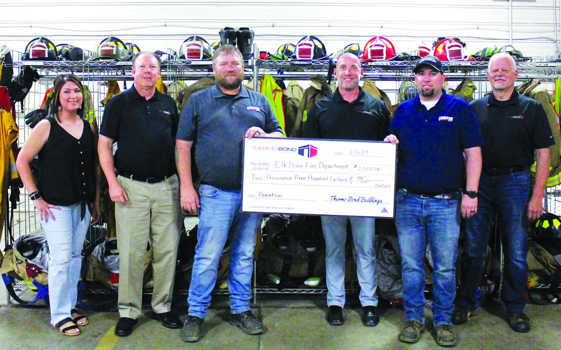 Thermo Bond donated $2,500 to the Elk Point Fire Department on June 6. Pictured are, from left, Angela Hajek – Marketing Coordinator, Bill Riley – CEO, Assistant Fire Chief Dan Herrity, Heath Van Roekel – Plant Manager, Assistant Fire Chief Ben Klunder and Greg Larson – Director of Quality Assurance. Photo by Beth Hutcheson • times1reporter@gmail.com