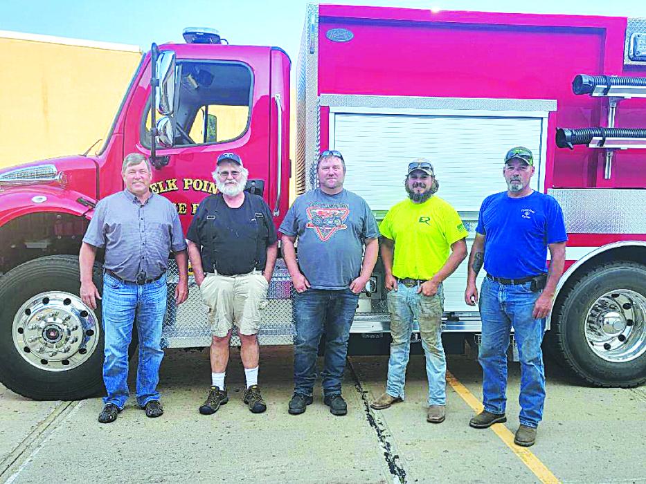 The Elk Point Volunteer Fire Department (EPVFD) donated $25,000 to the Elk Point Fire Protection District (EPFPD) to help pay for a new 3,000 gallon tanker. Pictured are, from left, Brian McInerney (EPFPD President), Jerry Kyte (EPFPD Secretary/Treasurer), Daniel Herrity (EPVFD Assistant Fire Chief ), Andrew Teply (EPVFD newly-certified state firefighter) and Don Klunder (EPVFD Fire Chief). Submitted photo