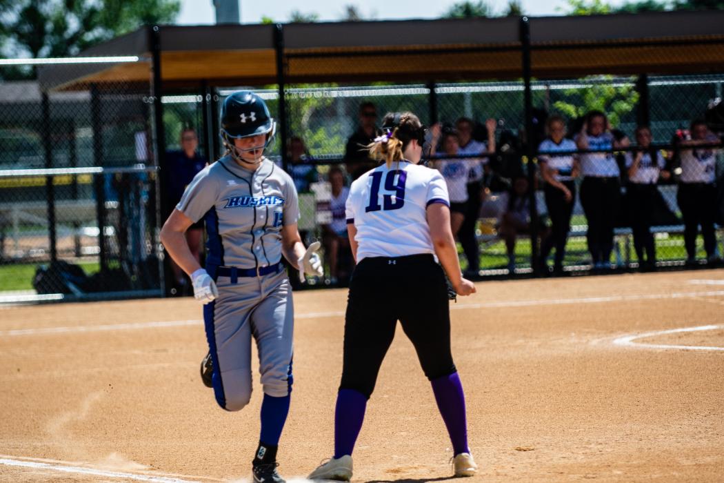 Grace Griffin makes it safely to first base. Photo by Peterman Sports Photography stevepeterman5@gmail.com