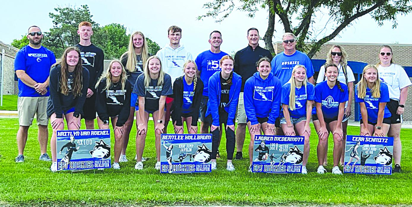 Posing for a picture before heading to the state track and field meet in Sioux Falls Thursday, May 25, were front from left, Josie Curry, Alyssa Chytka, Grace Peed, Kaitlyn VanRoekel, Lauren McDermott, Cera Schmitz, Makinley Hammitt, Paige Jacobs and Molli Harkin; and back, Coach Jake Terry, Joe Cross, Bentlee Kollbaum, Landon Johnsen, Coach Steve Cross, Coach Brett Reed, Coach Jeff Zeller, Coach Stacie Sheley and Coach Alicia Loiland. Submitted photo